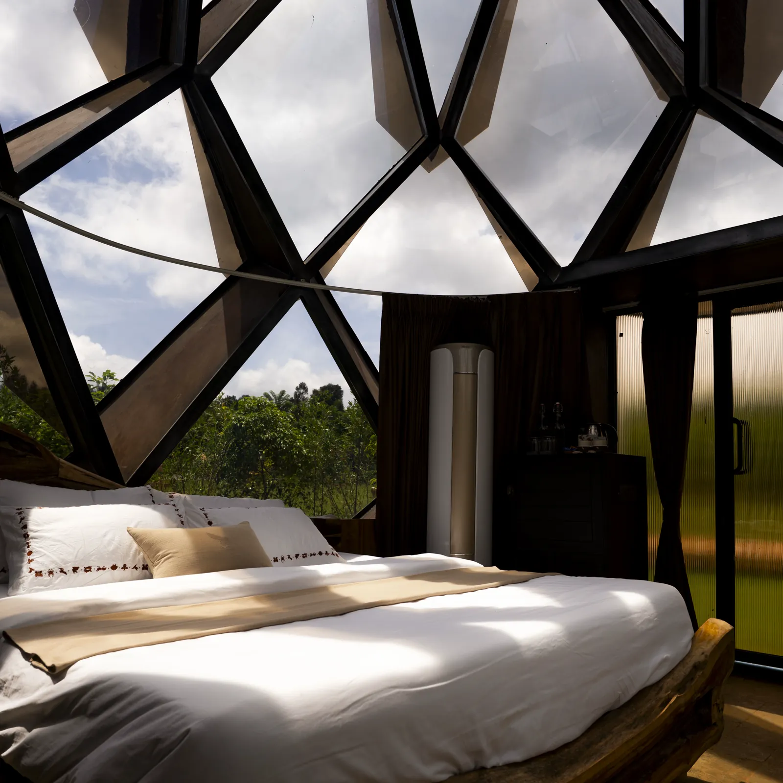 The Amber Chamber — the bed against the faceted glass