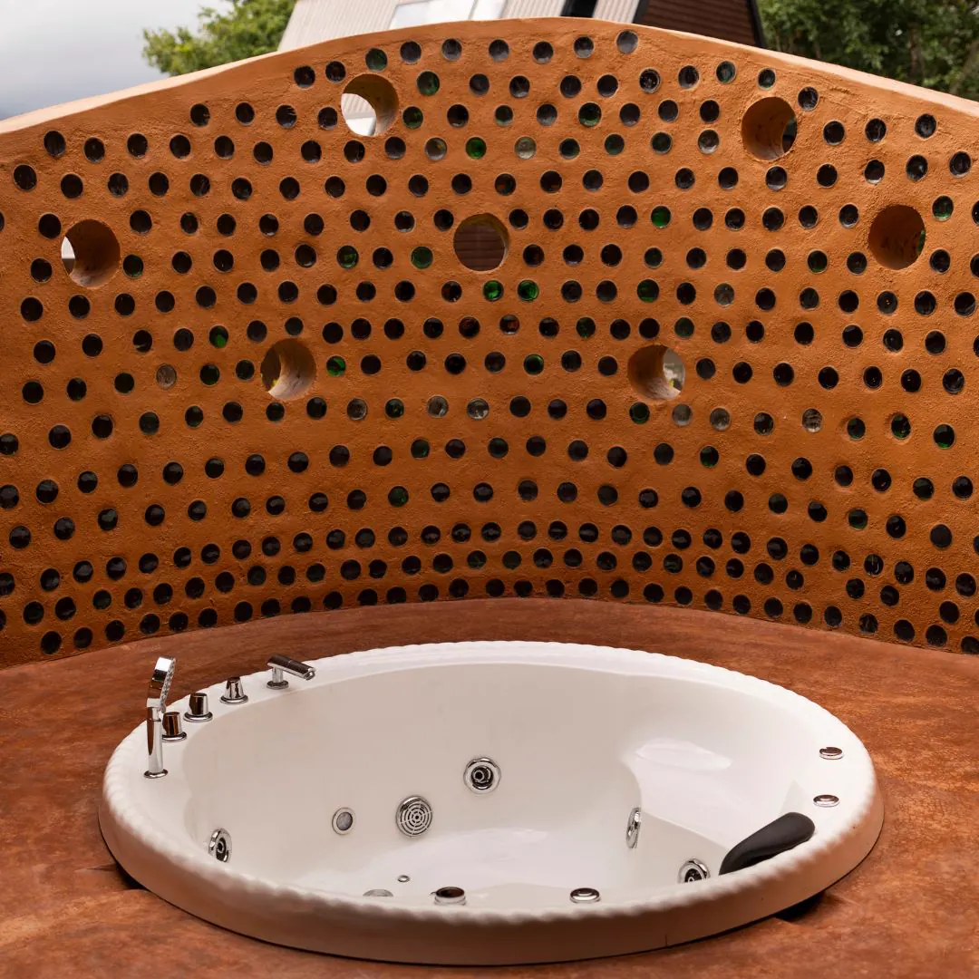 The Colony — the jacuzzi beneath its perforated dome