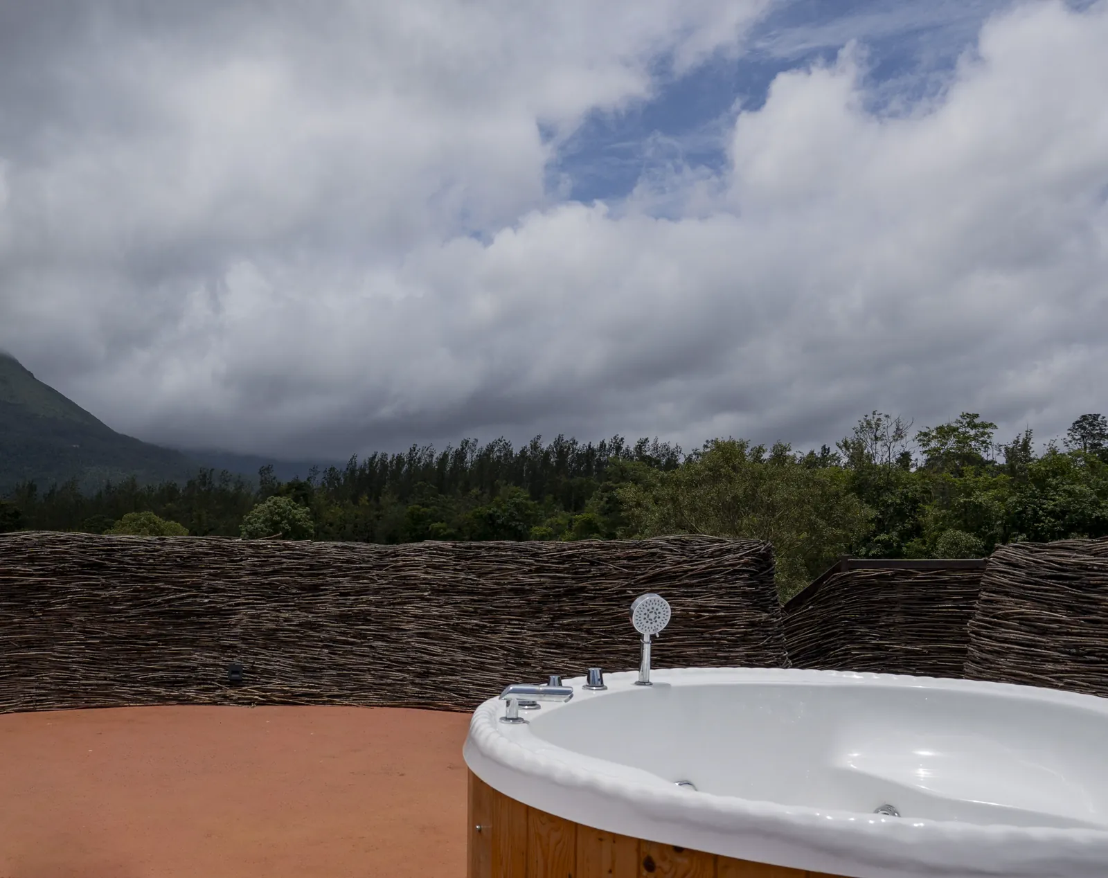 The Nest — the rooftop jacuzzi, open to the sky