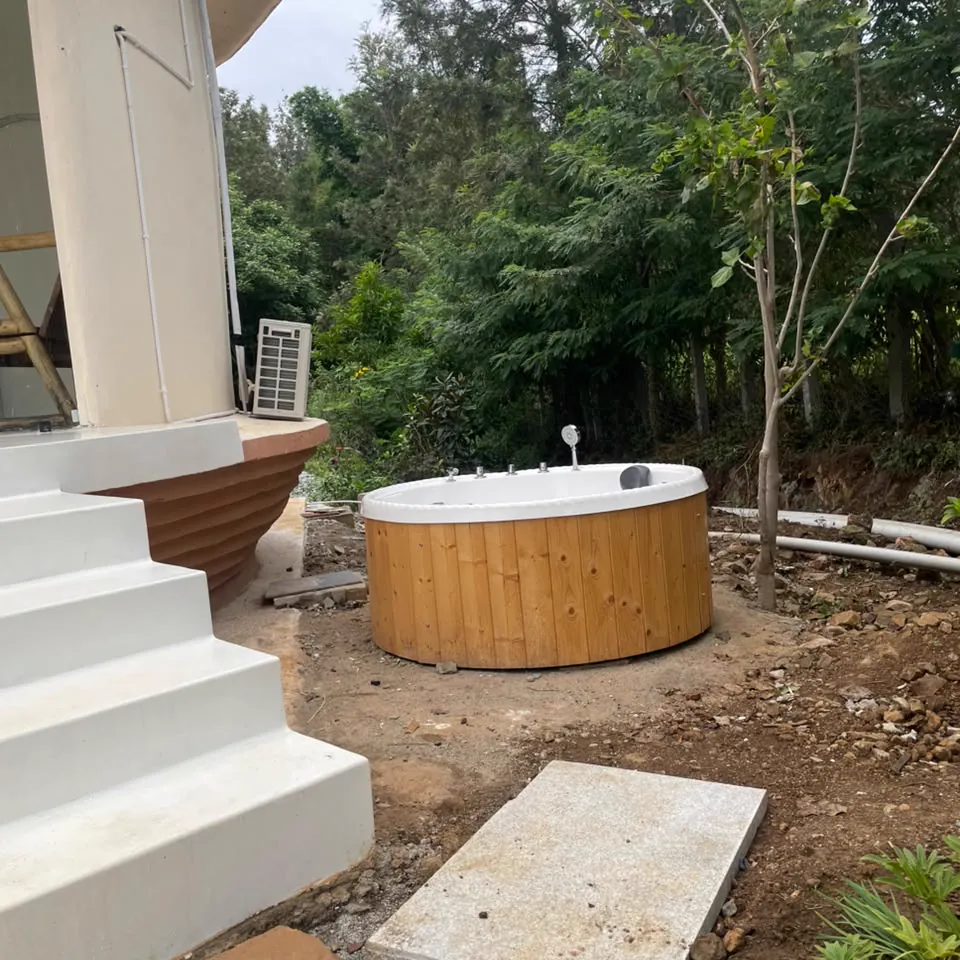 The Shore — the outdoor hot tub beside the shell